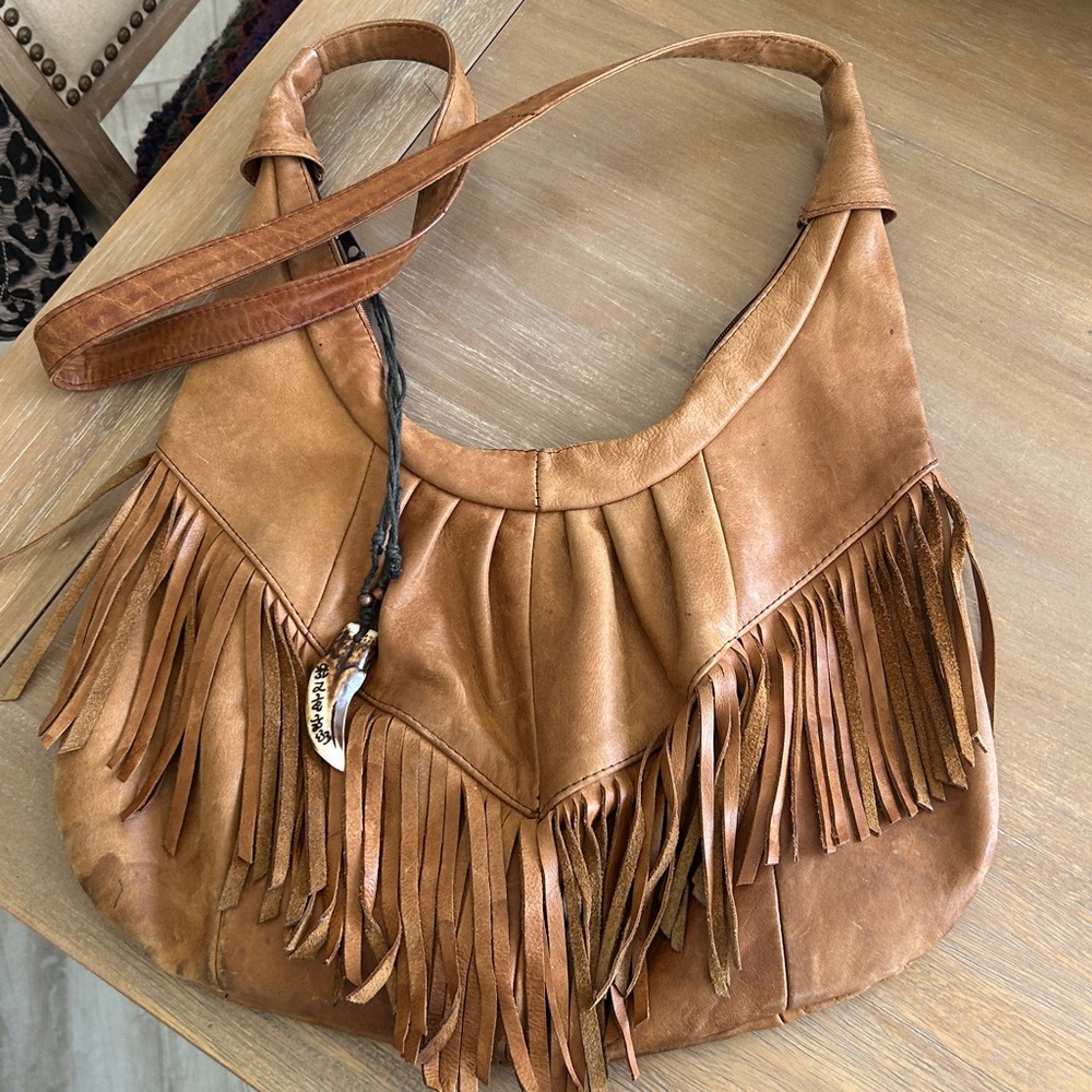 Francesca’s Boho Fringe Crossbody Bag with Carved Pendant